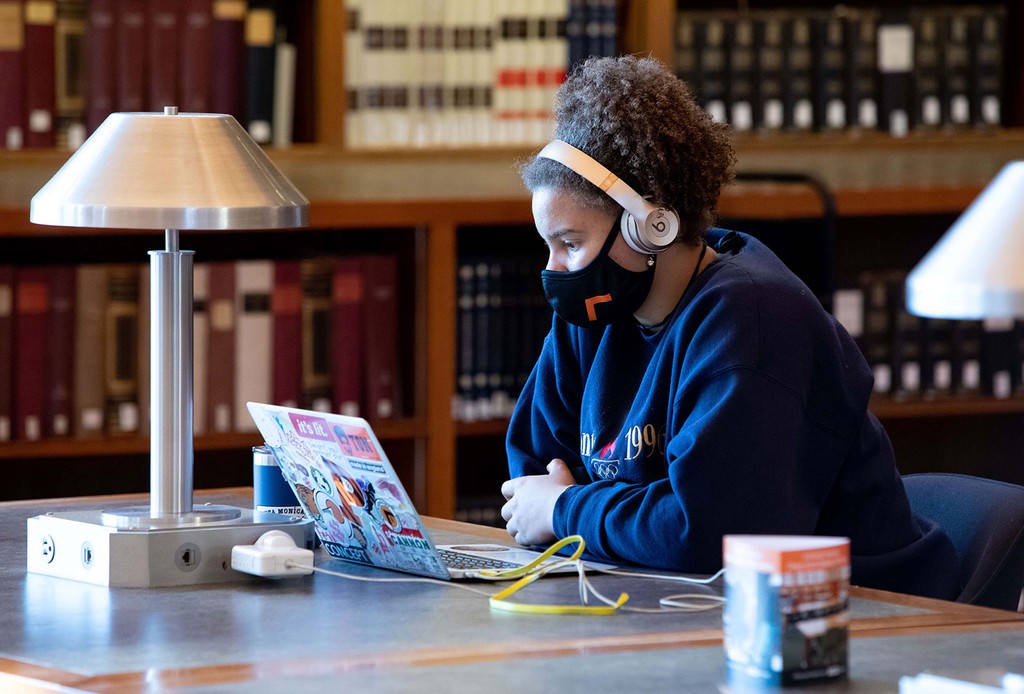 A Princeton University student studies in the Firestone Library on campus. The Emma Bloomberg Center for Access and Opportunity advances the university’s commitment to college access and success.