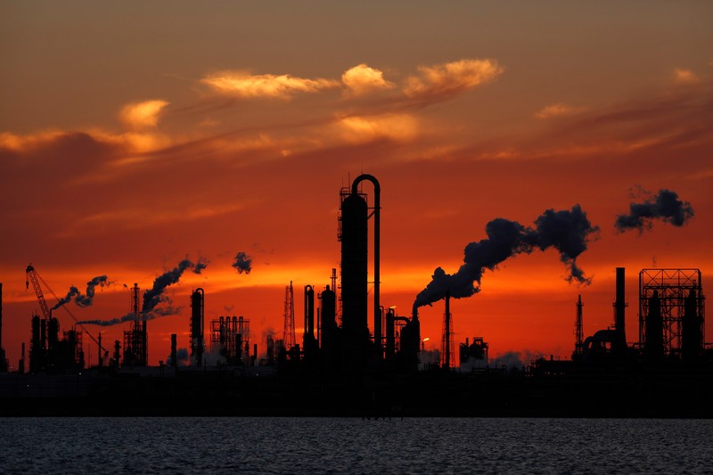 Oil refinery at sunset