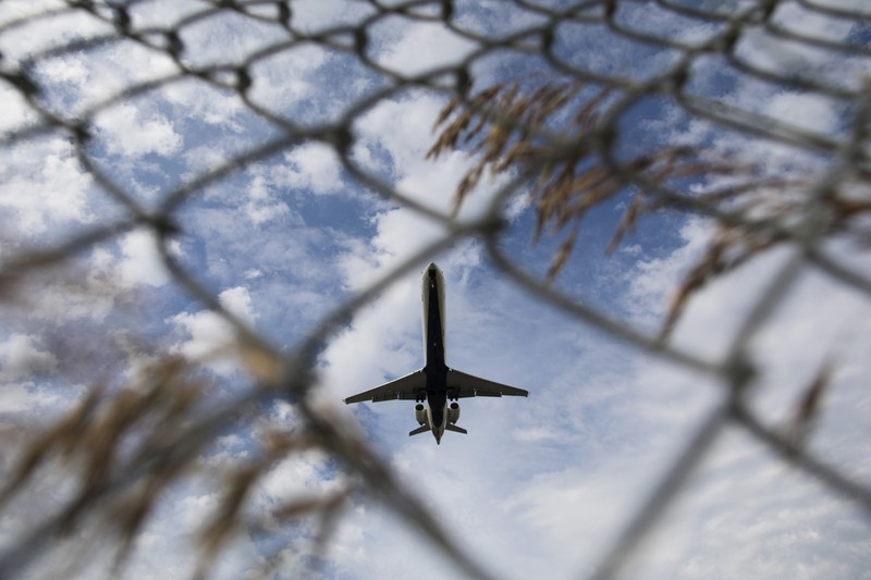A commercial plane prepares to land