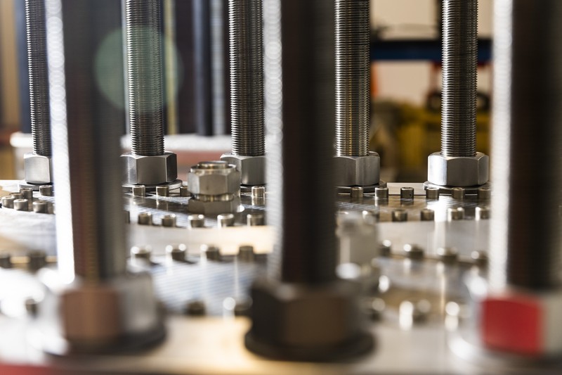 Close-up of bolts on a electrolyzer stack