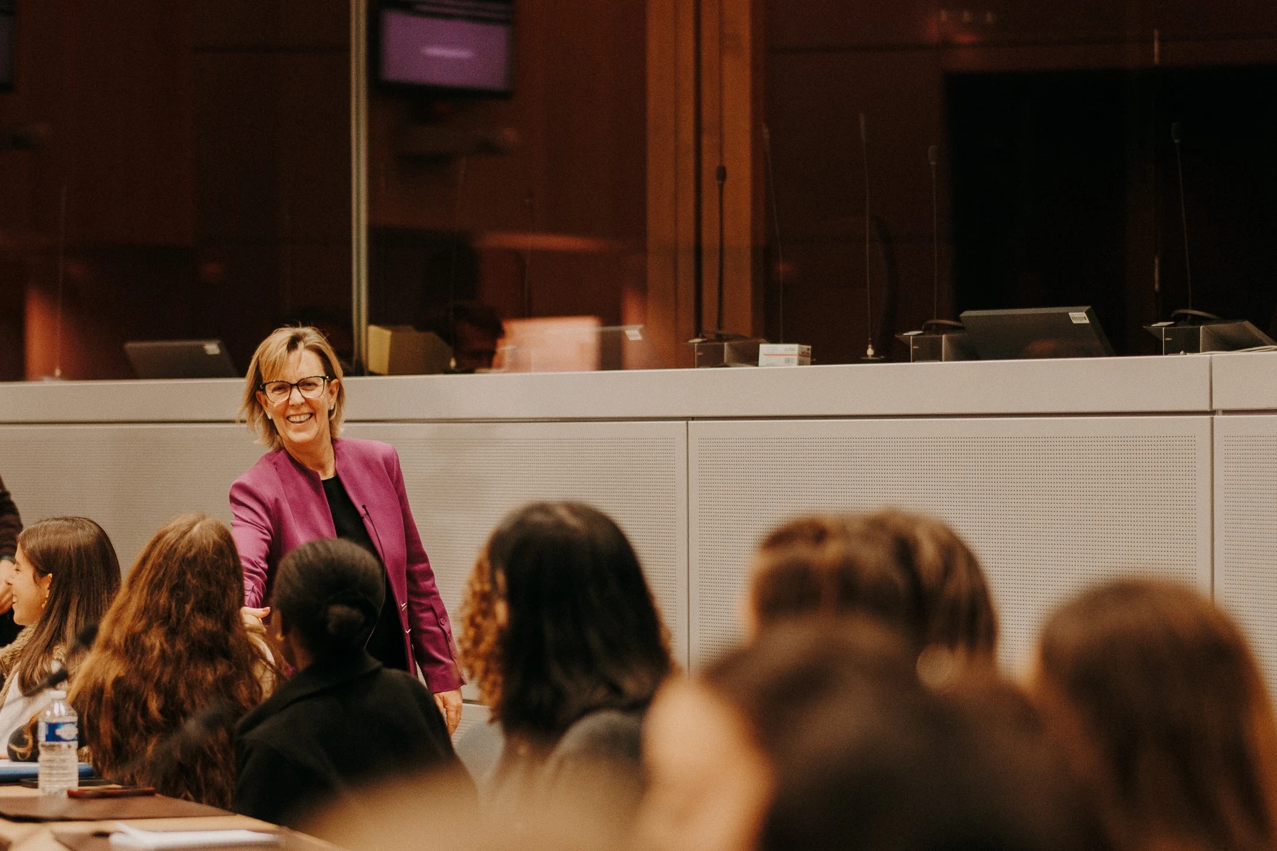Maria Luis Albuquerque greets Bloomberg Finance Pathways students at an event