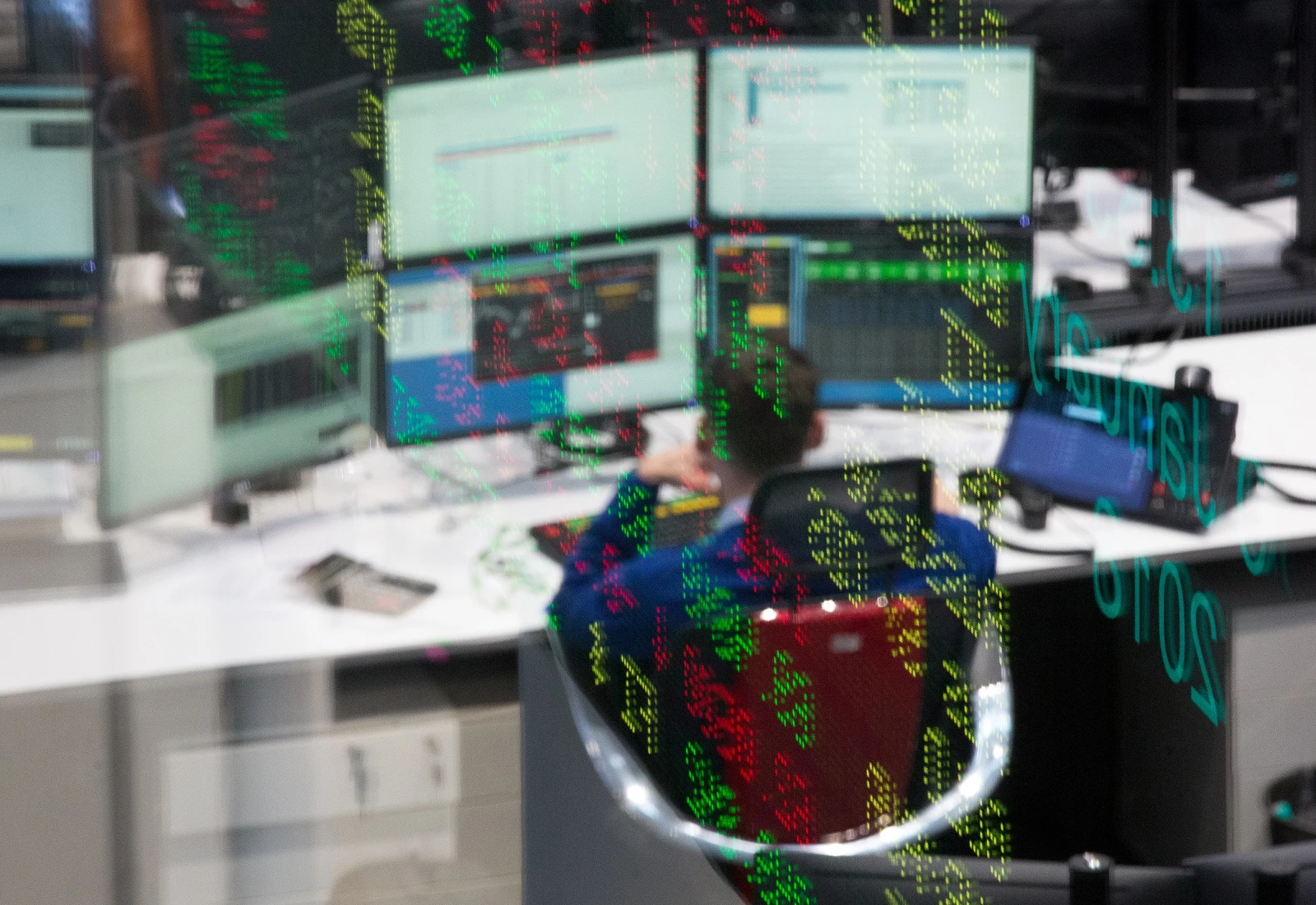 Stock price information is reflected in a glass panel