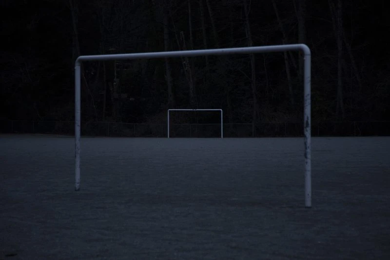 An empty playing field and goal posts