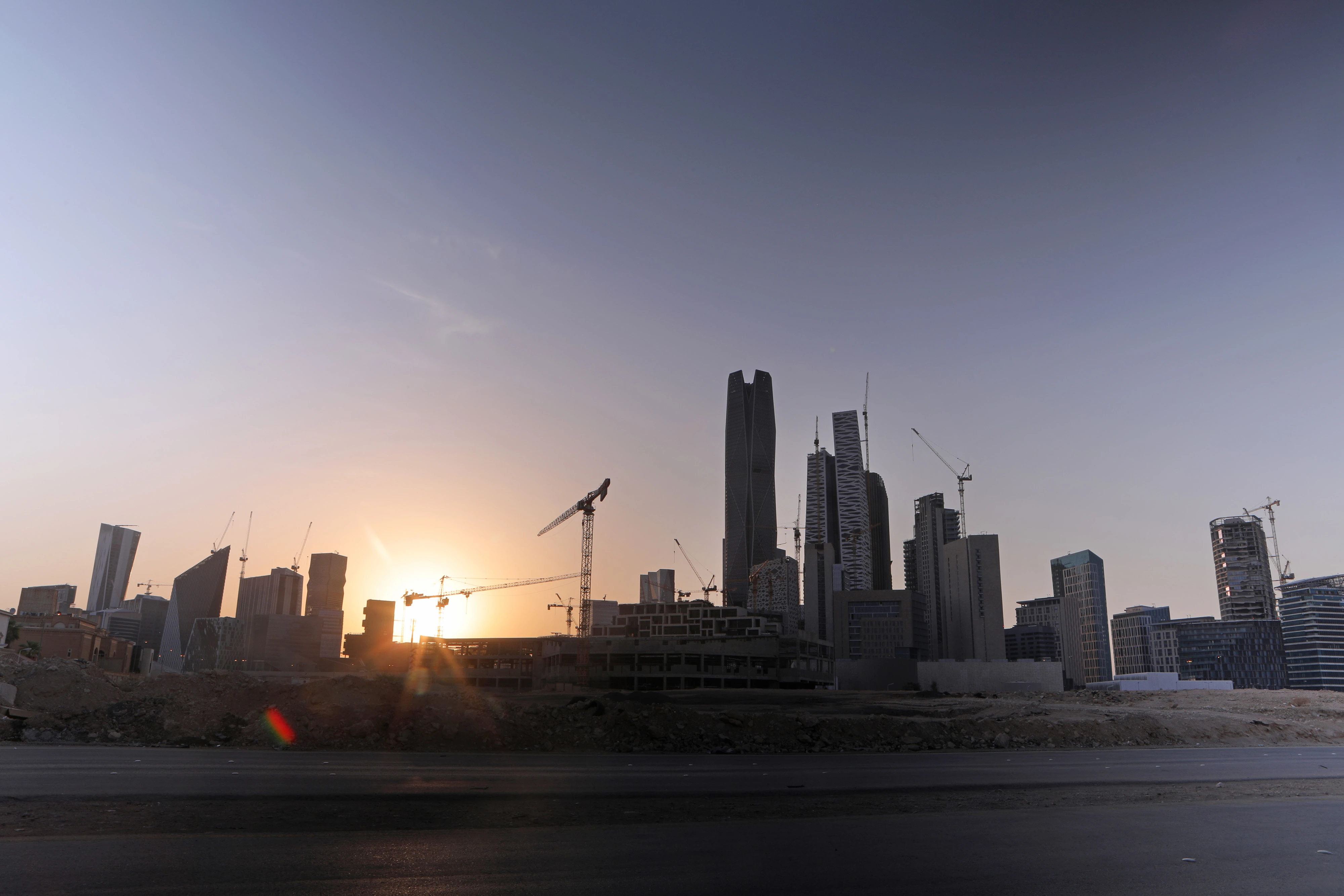 Sunset over buildings at the King Abdullah Financial District in Riyadh, Saudi Arabia