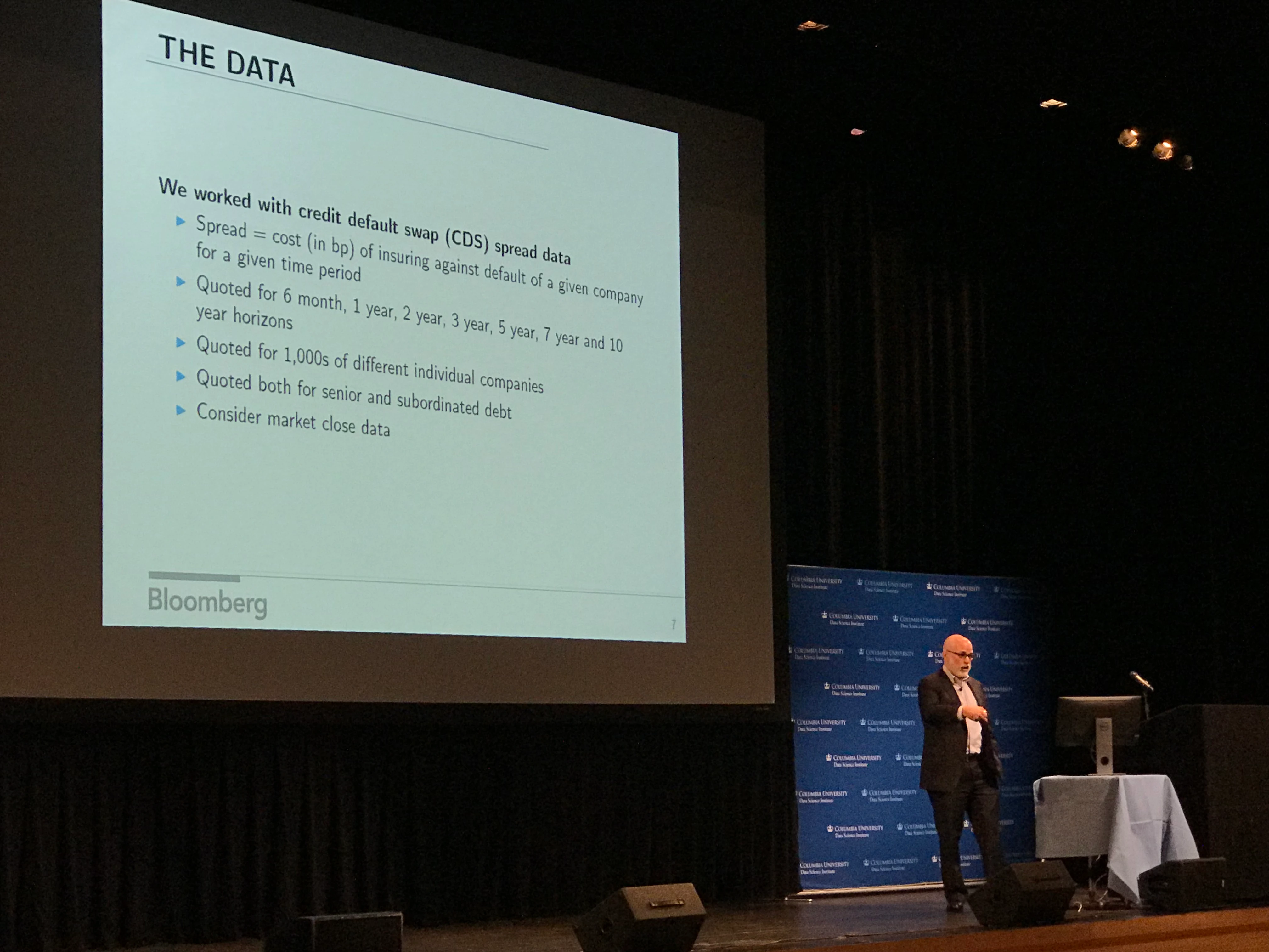 Harvey Stein presents a slide titled "The Data" and discusses how Bloomberg worked with credit default swap spread data.