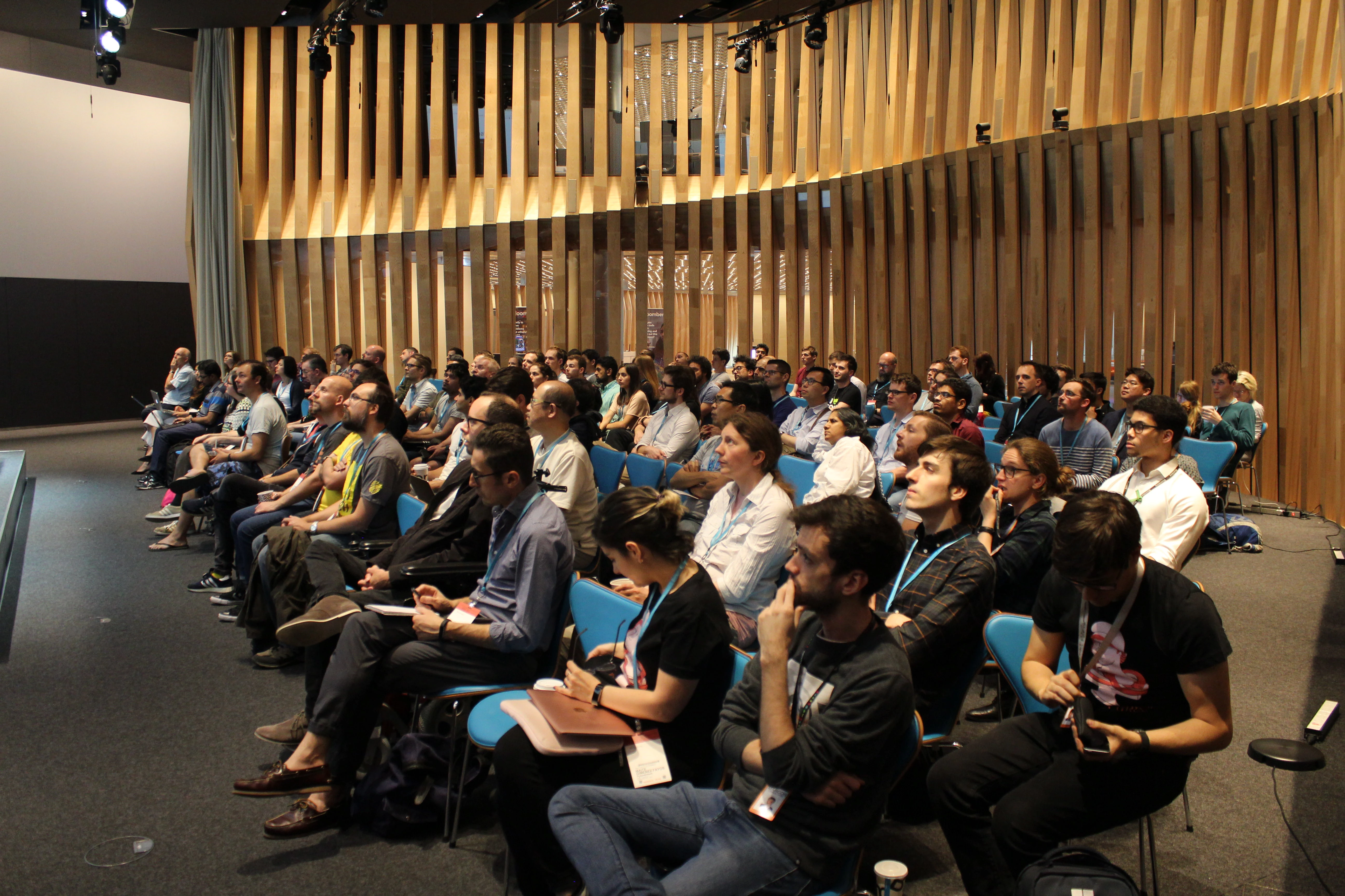IMG_90501 A large group of event attendees watch the stage.