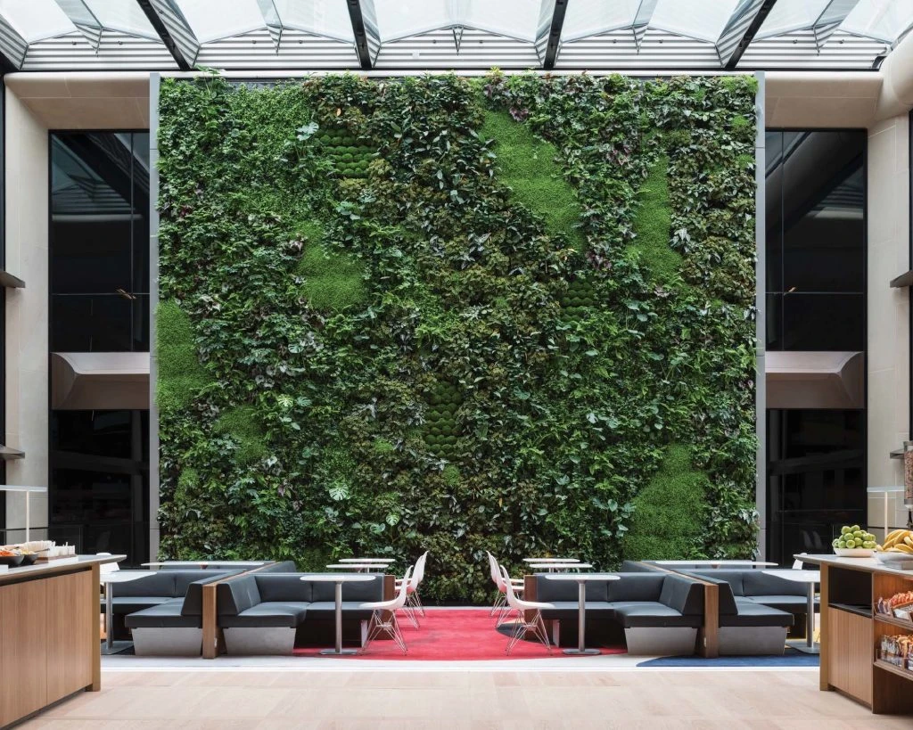 BloombergLondon_GreenWall-1024×819 The high-ceiling pantry is a great space for meetings with colleagues and clients. It overlooks St. Paul’s Cathedral and is flooded with natural light from the atrium above — making it a perfect space for our “living wall.”