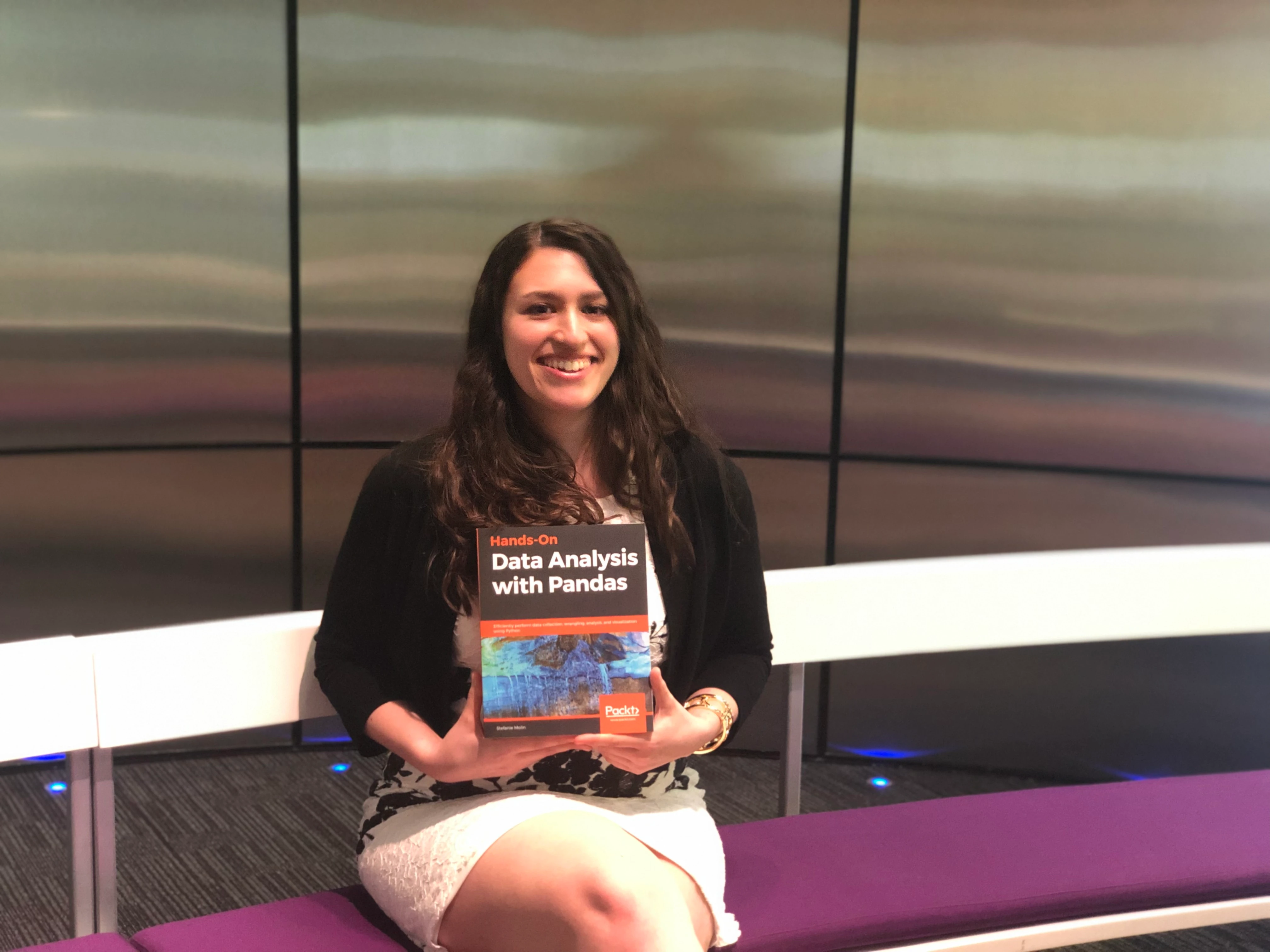 IMG_4612 Bloomberg’s Stefanie Molin poses with her new book, Hands-On Data Analysis with Pandas