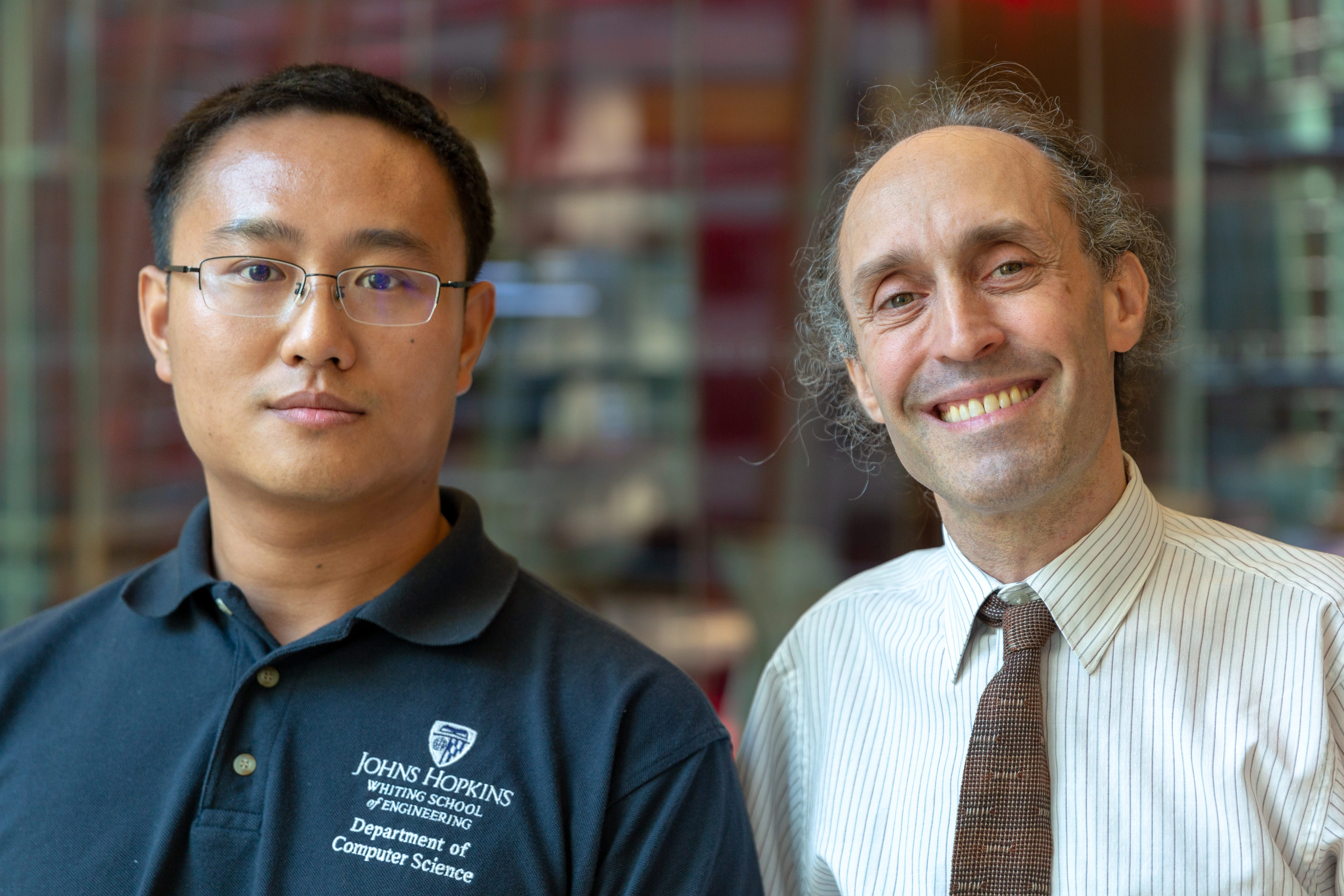Bloomberg Ph.D. Fellow Hongyuan Mei (left) with his advisor, Professor Jason Eisner of Johns Hopkins University (Photographer: Lori Hoffman/Bloomberg)