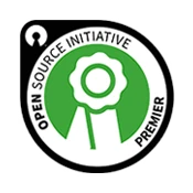 The Open Source Initiative Premier logo is round with a centered white medal with a green background. The green background is surrounded by a white ring containing the text "Open Source Initiative Premier" wrapping around it. Outside that ring is a black border.
