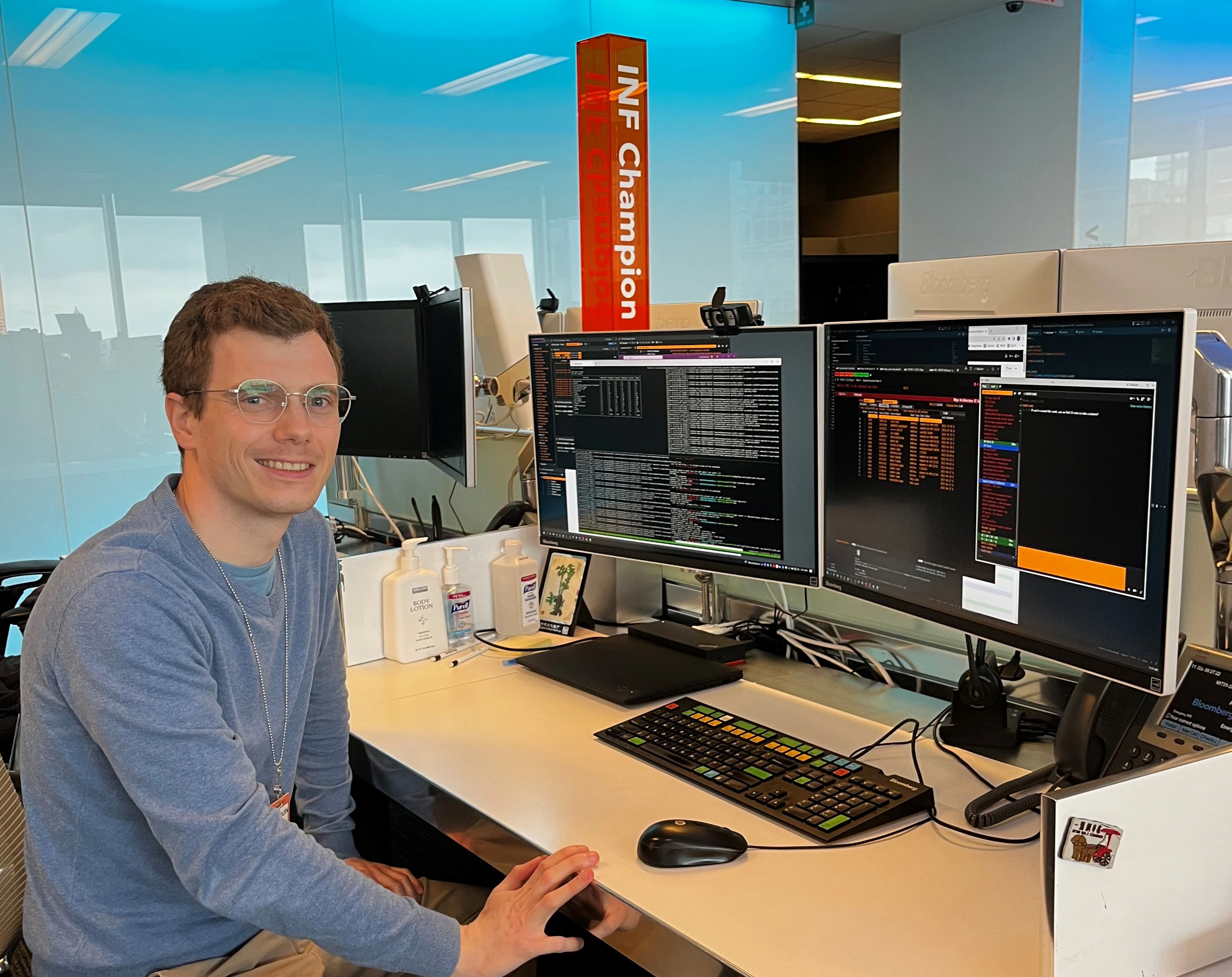Baudouin-Giard-landscape Baudouin Giard seated in front of his computer screens at his desk in the Bloomberg office