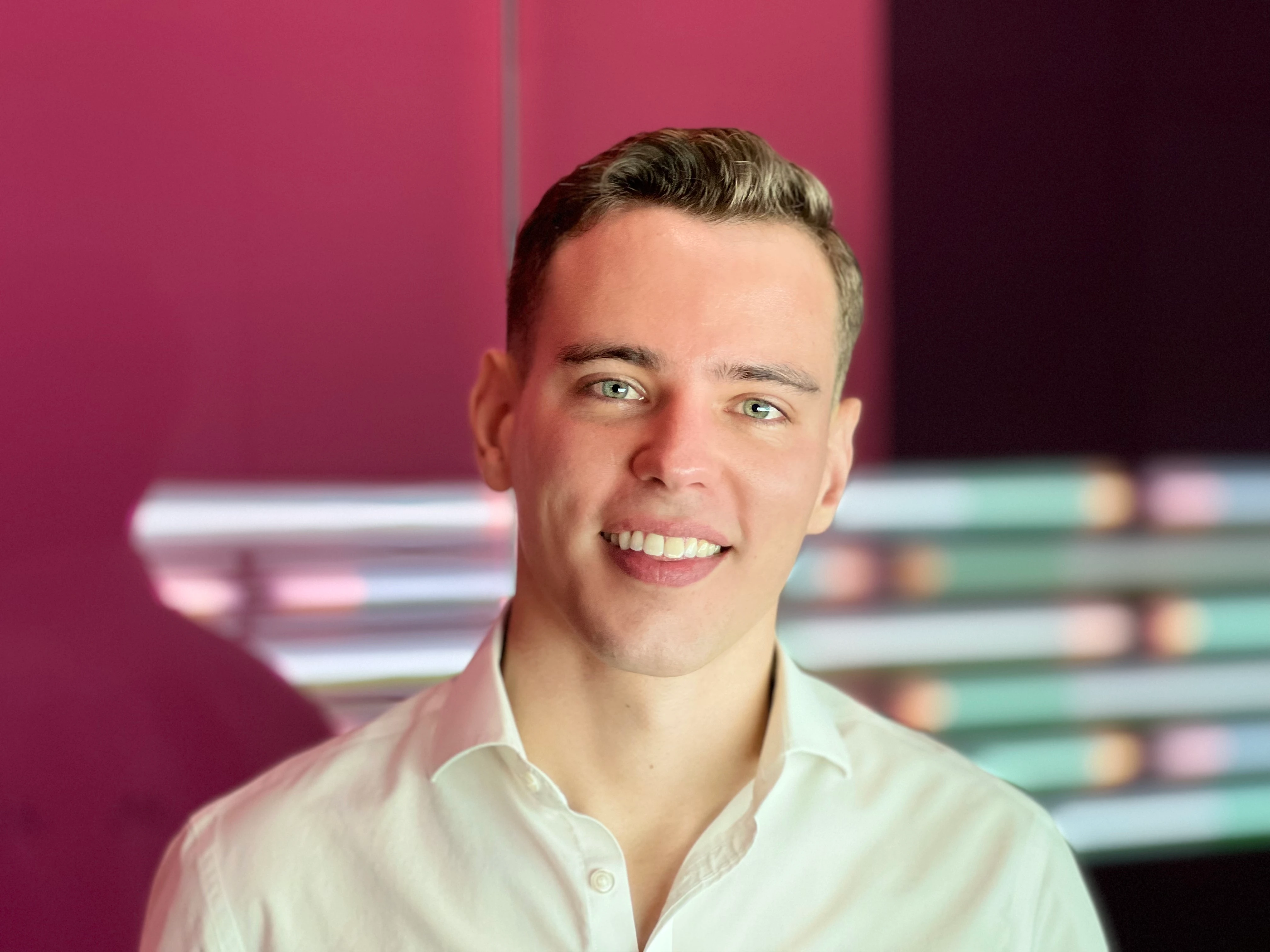 IMG_1417 Robert Vann standing in front of a bank of lights