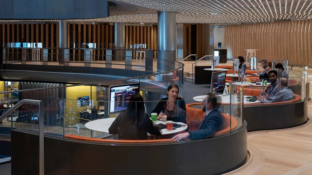 Bloomberg-London-office-collaboration-spaces-allow-you-to-pull-up-a-quiet-corner-whenever-you-need-to-get-together-for-impromptu-meetings-2 You can find collaboration spaces all over Bloomberg building's. London's spaces feature a Bloomberg Terminal workstation and provide a quiet nook for a team to huddle and plan projects.