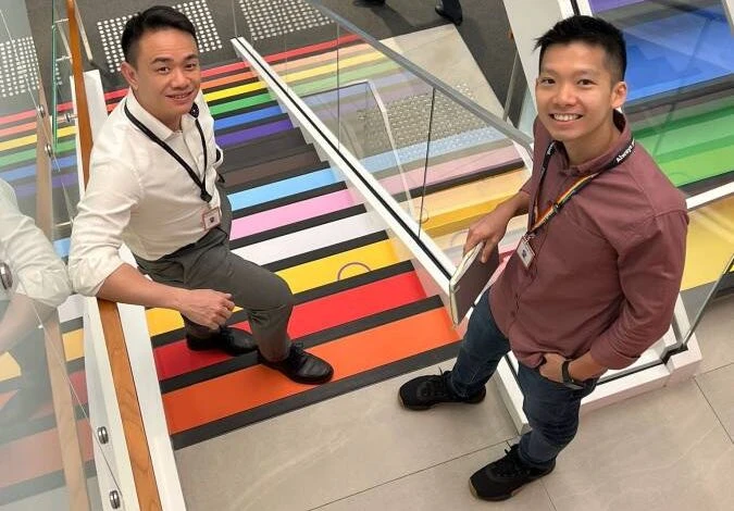 image16 Members of BPROUD show off the Pride steps this year at Bloomberg’s Singapore office.