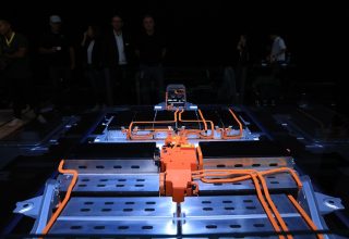 Cables, components and a battery pack sit on the chassis of an Opel Corsa electric automobile at the Adam Opel AG exhibiton stand  ahead of the IAA Frankfurt Motor Show in Frankfurt, Germany, on Monday, Sept. 9, 2019. The 68th IAA show runs from Sept. 12-22. Photographer: Krisztian Bocsi/Bloomberg