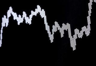 A data graph tracks the movement of stocks on the stock exchange in Germany. Photographer: Alex Kraus/Bloomberg