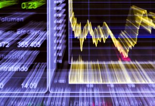 Stock market movements on an electronic display. Photographer: Paul Hanna/Bloomberg